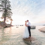 Lake Tahoe post-wedding photo shoot with the bride and groom in the water