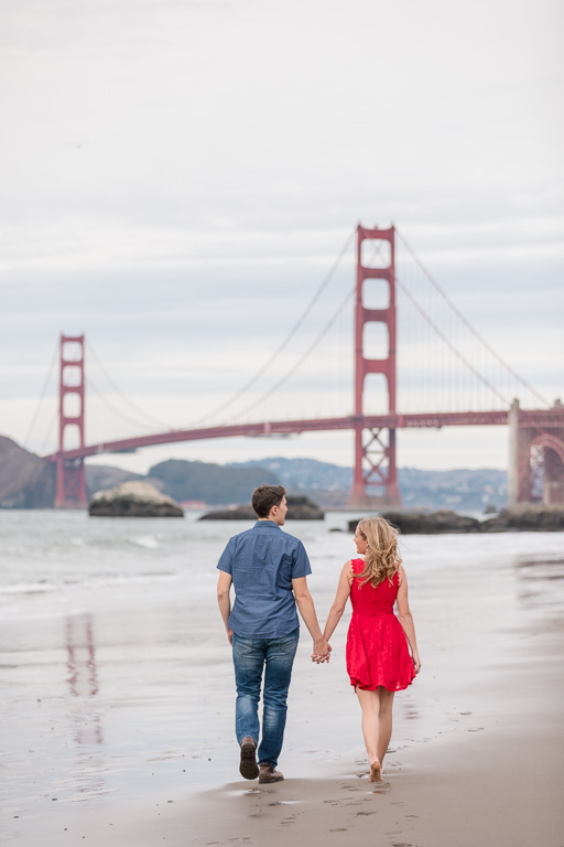 candid San Francisco beach engagement picture