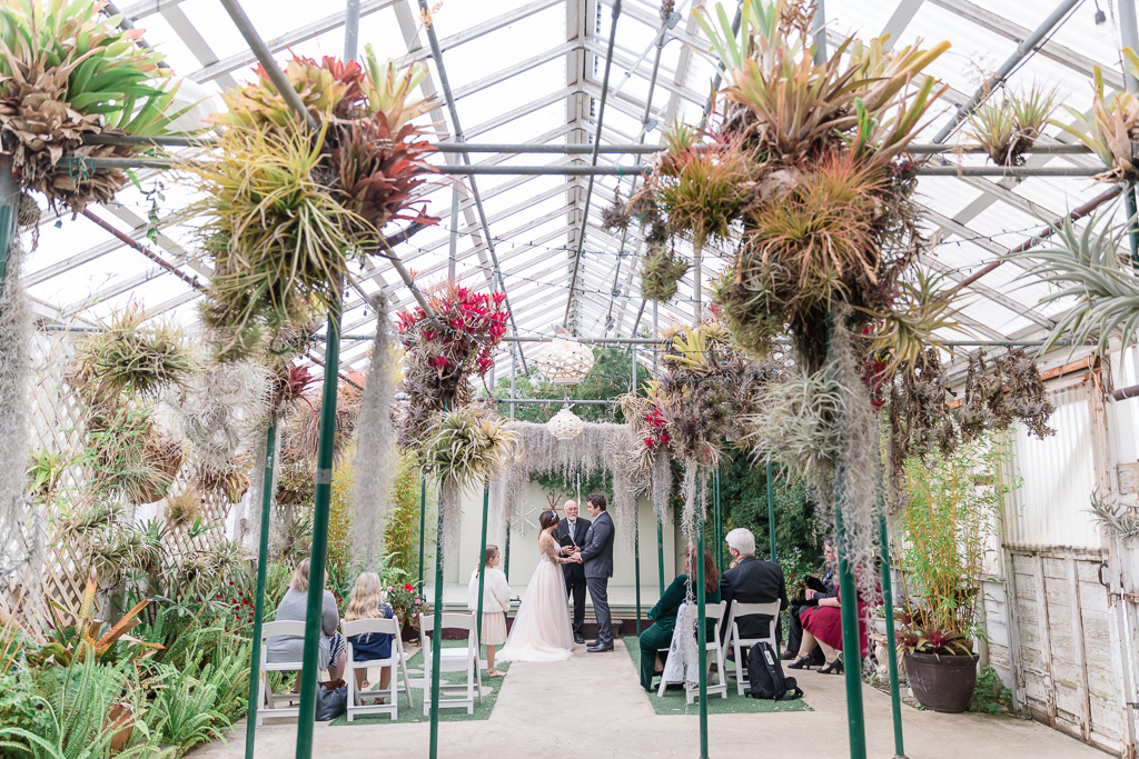wedding ceremony inside a Pacifica greenhouse