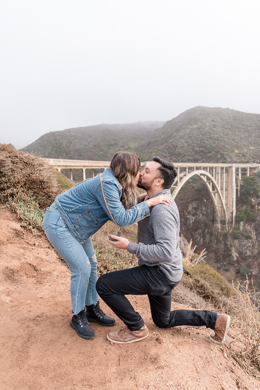 quick kiss in front of the Bixby Bridge