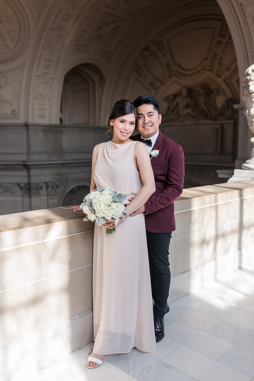 beautiful couple after tying the knot at SF city hall