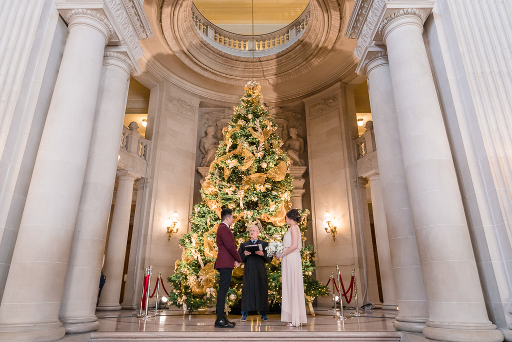 San Francisco city hall wedding ceremony during Christmas holidays