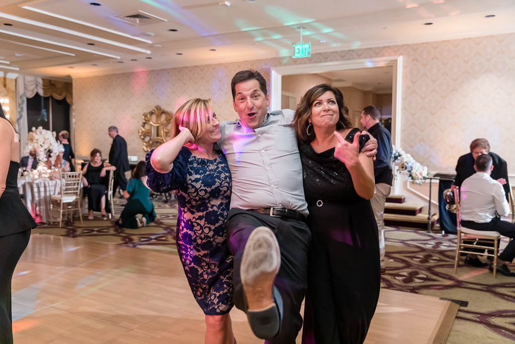 wedding guests having a blast during the dance party