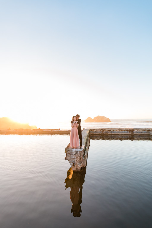 golden sunset engagement picture at Sutro Baths