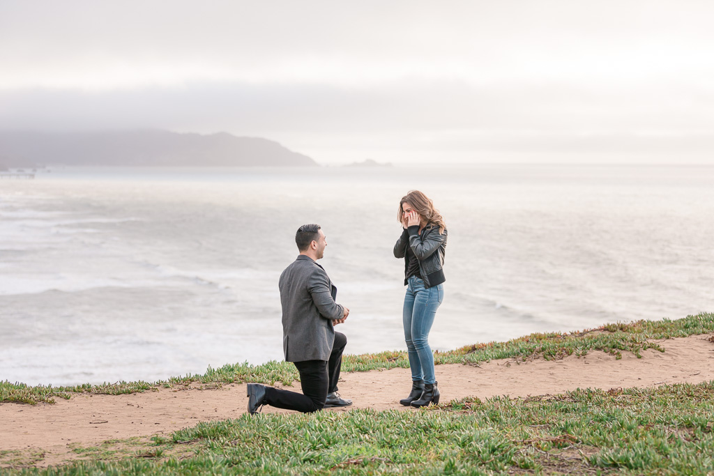 San Francisco romantic surprise proposal by the ocean at Mussel Rock Park