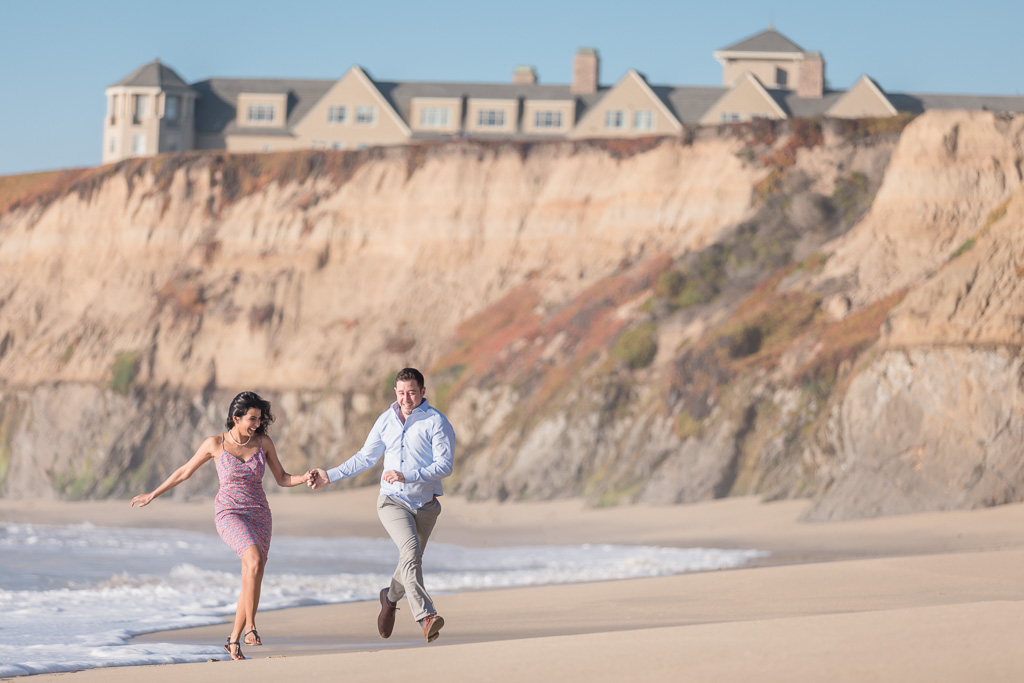 fun engagement photo in Half Moon Bay by the pacific ocean
