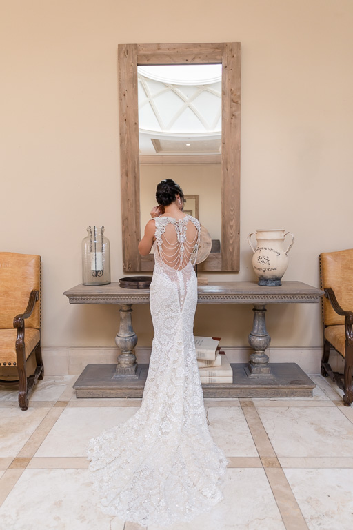 bride in her galia lahav wedding gown with a stunning back design