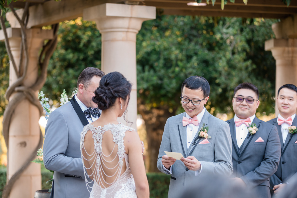 groom reading his heartfelt vows