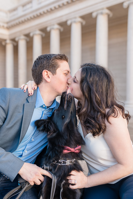 puppy wants to join in the kissing at parents' San Francisco engagement session