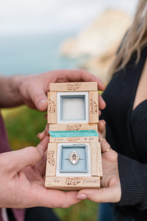 a designer engagement ring in a custom made jenga ring box