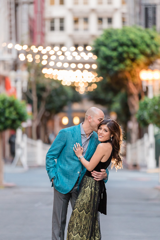 San Francisco Maiden Lane engagement shoot at dusk with string lights in background