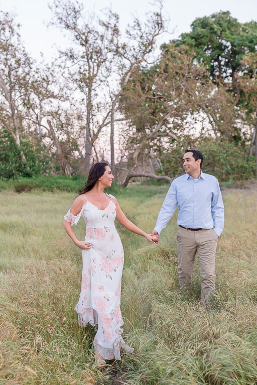 walking in the nature holding hands save the date photo