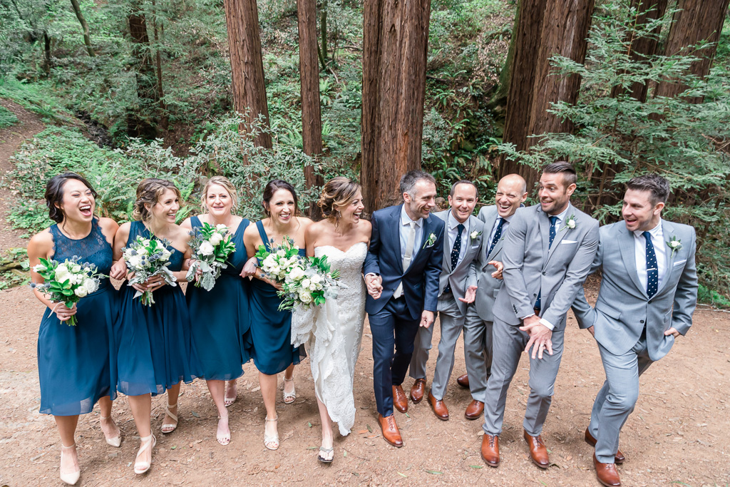 wedding bridal party walking in the redwoods