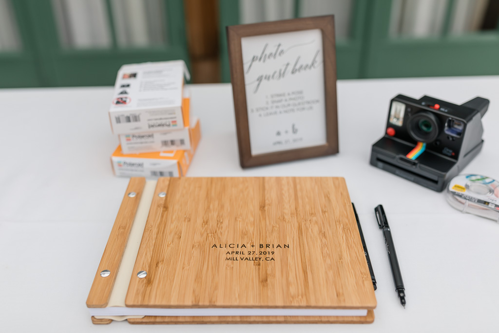 guest sign-in table with Polaroid camera