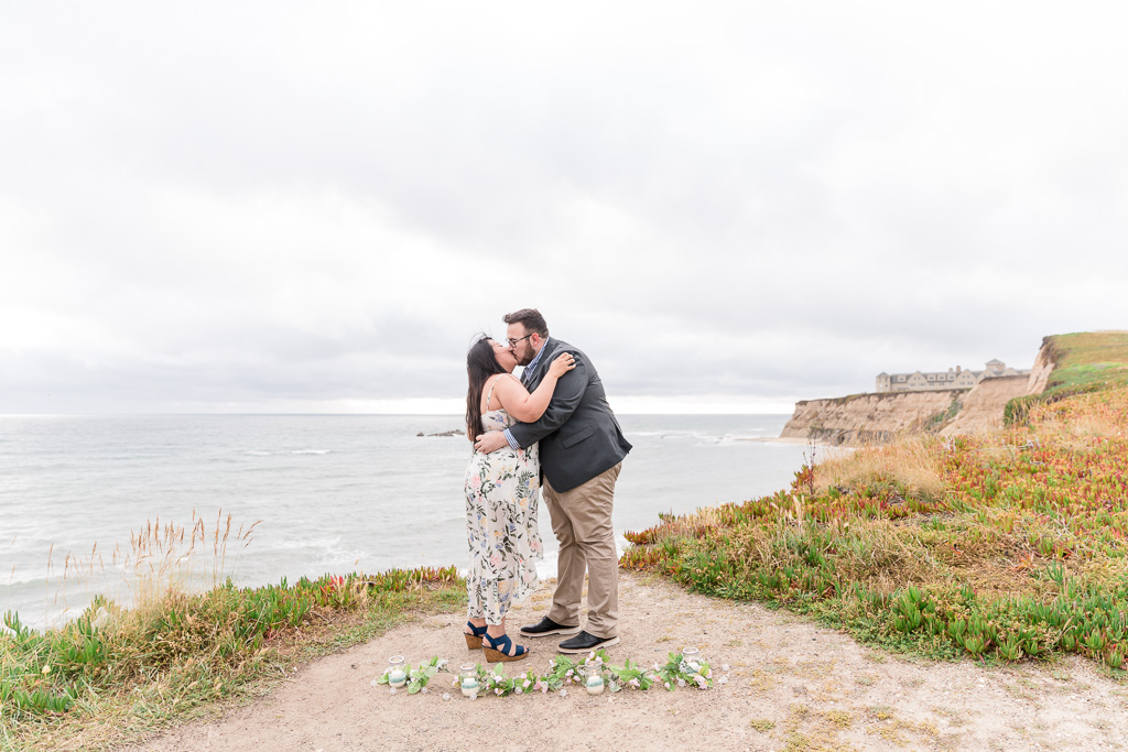first kiss after they got engaged here at Half Moon Bay Ritz Carlton