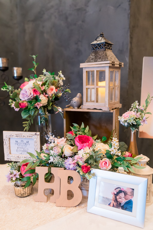 wedding welcome table high-end floral and lantern design