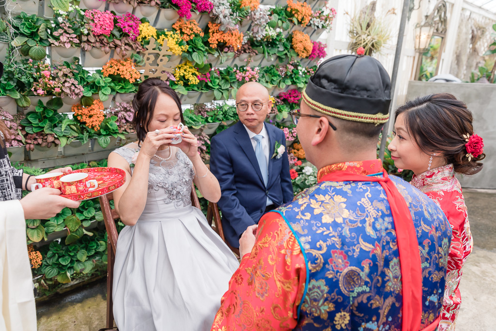 mother of the groom sipping the tea