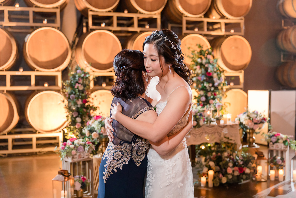 bride slow dancing with her mother