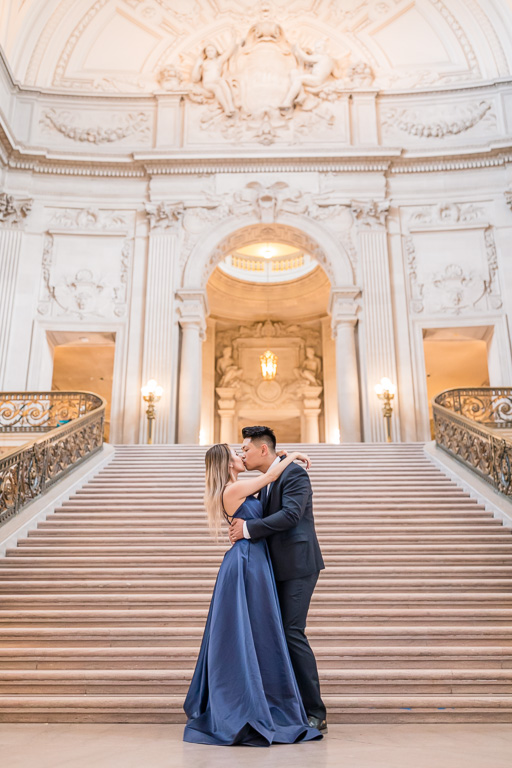 pretty SF engagement photo in a grand architectural setting