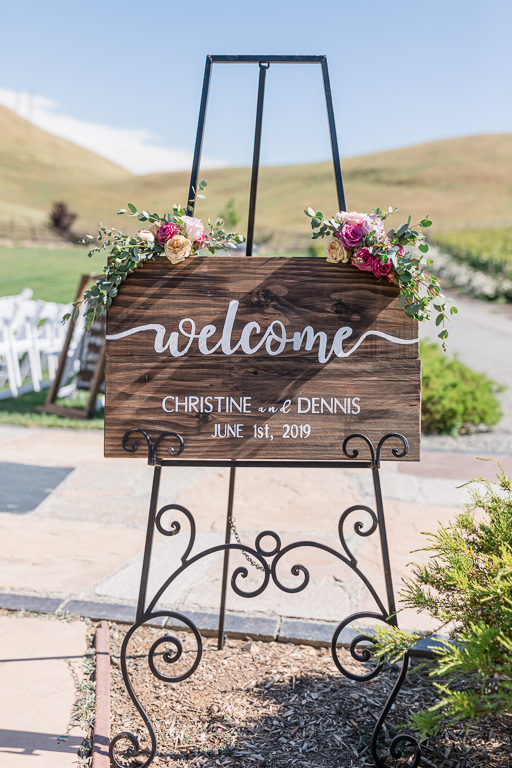 wooden wedding welcome sign with floral