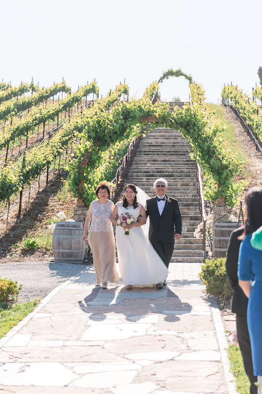 bride walked down that dramatic staircase through the vineyards to the ceremony