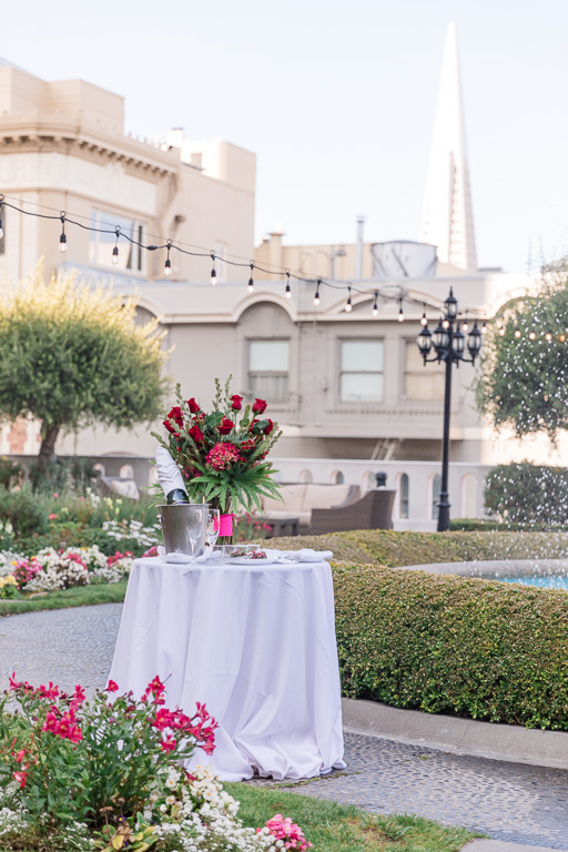 a private table setup for SF Fairmont rooftop surprise proposal