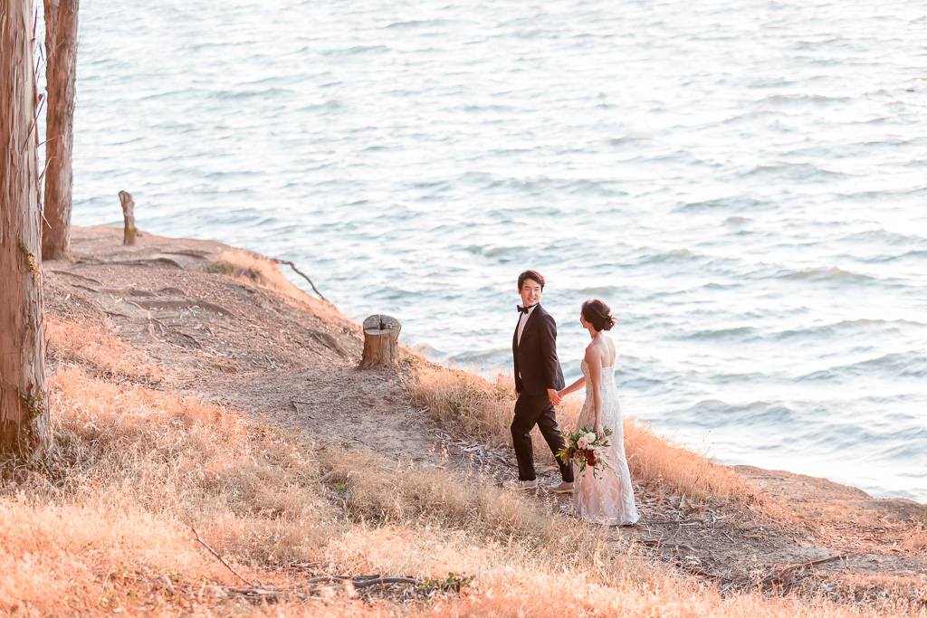 Coyote Point trail wedding photo along the water