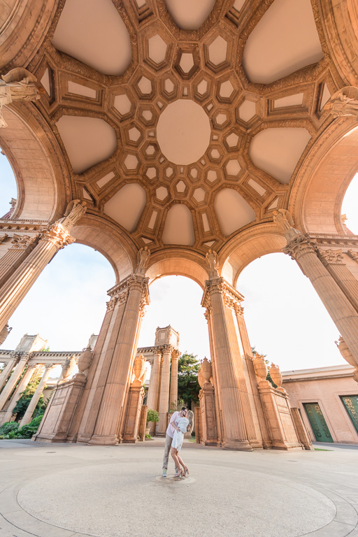 engagement picture taken under the dome of Palace of Fine Arts