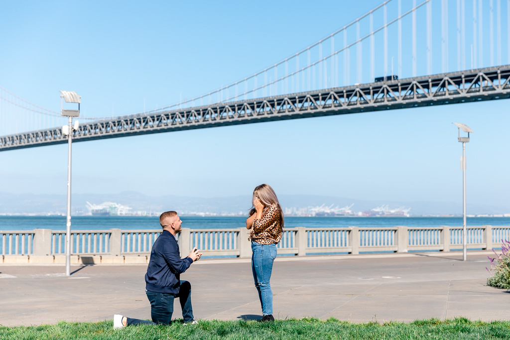 surprise proposal in front of the Bay Bridge