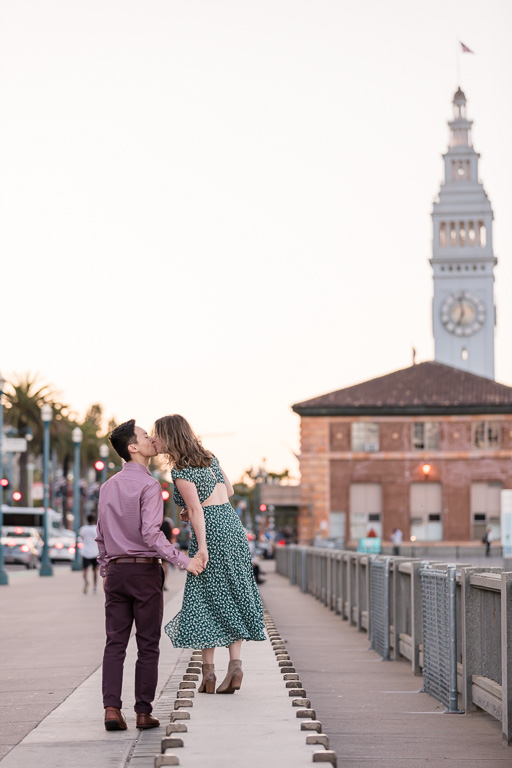 engagement photo in front of the Ferry Building