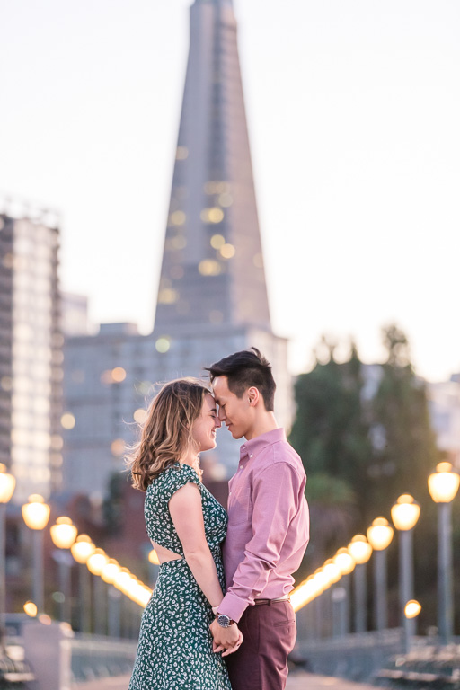 engagement photo in front of TransAmerica Pyramid