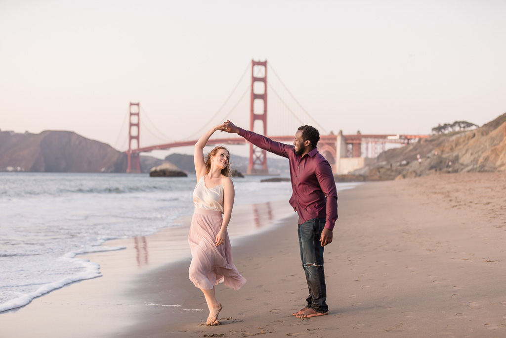 dancing in front of the iconic bridge