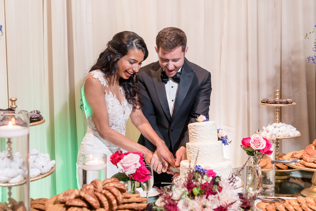 couple cutting their cake together