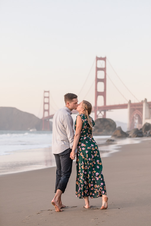 engagement couple portrait kissing on the San Francisco beach