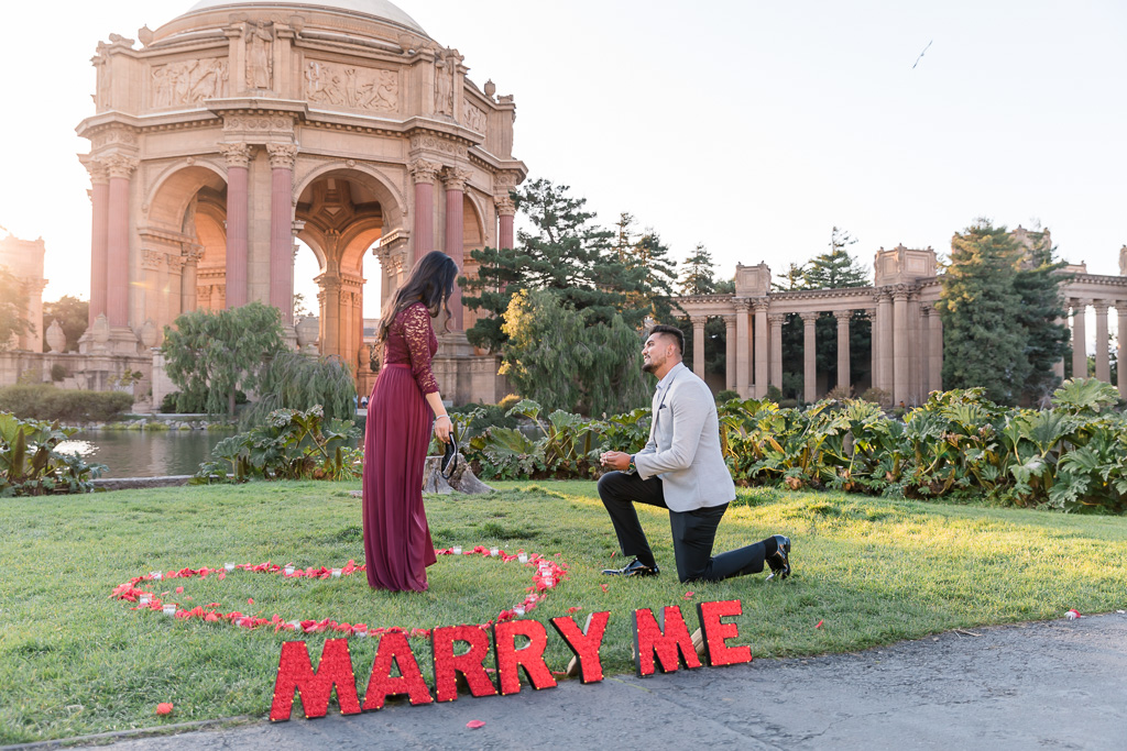Palace of Fine Arts surprise proposal with will you marry me sign