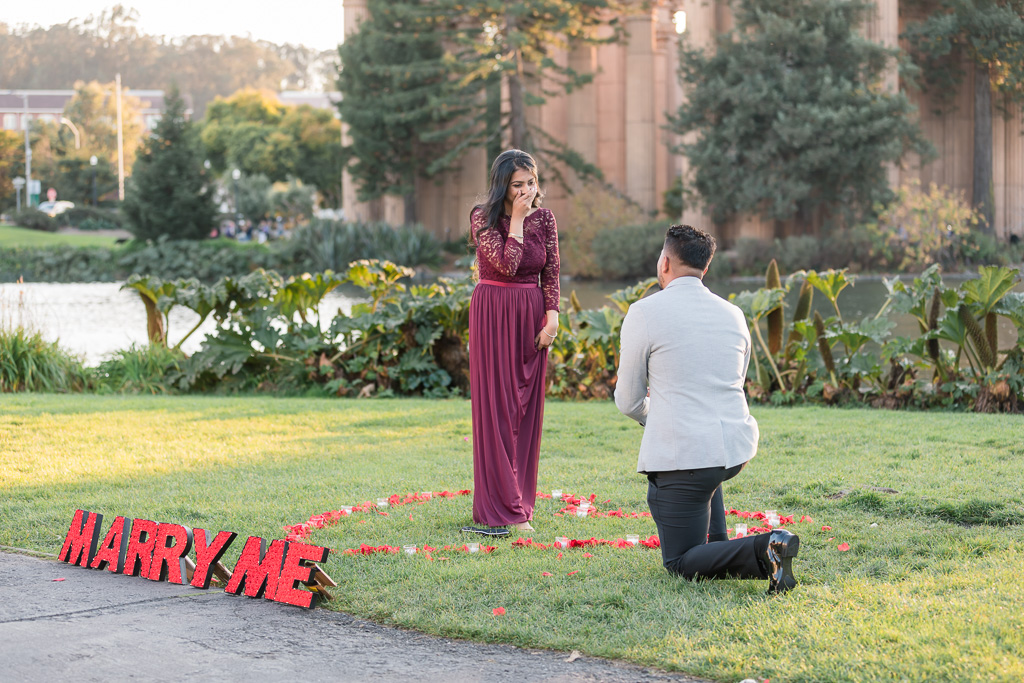 sweet signage and rose petal setup for this San Francisco surprise proposal