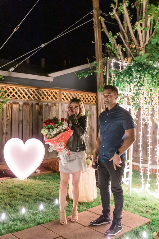 fiance and friends surprised her with a romantic proposal in their San Jose backyard