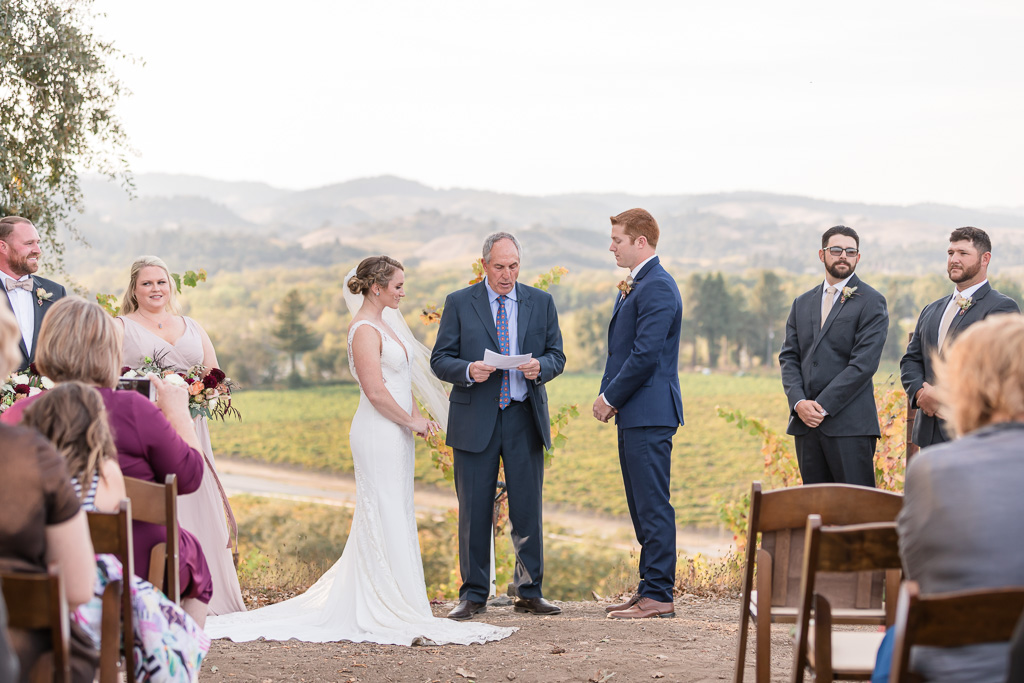 wedding ceremony overlooking the vineyards
