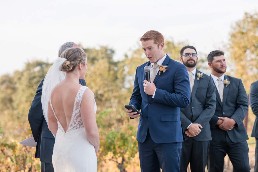 groom reading his vows