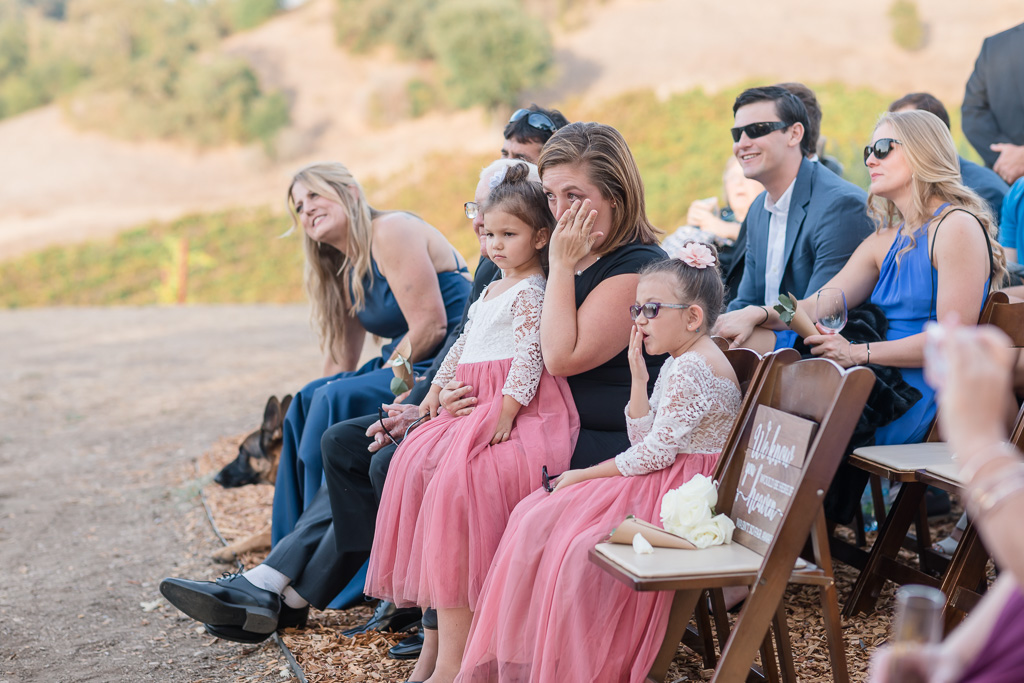 family crying during wedding ceremony