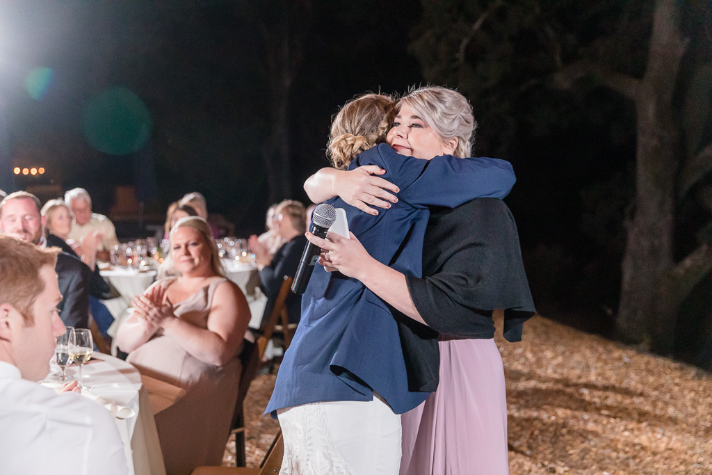 bride hugging with her sister