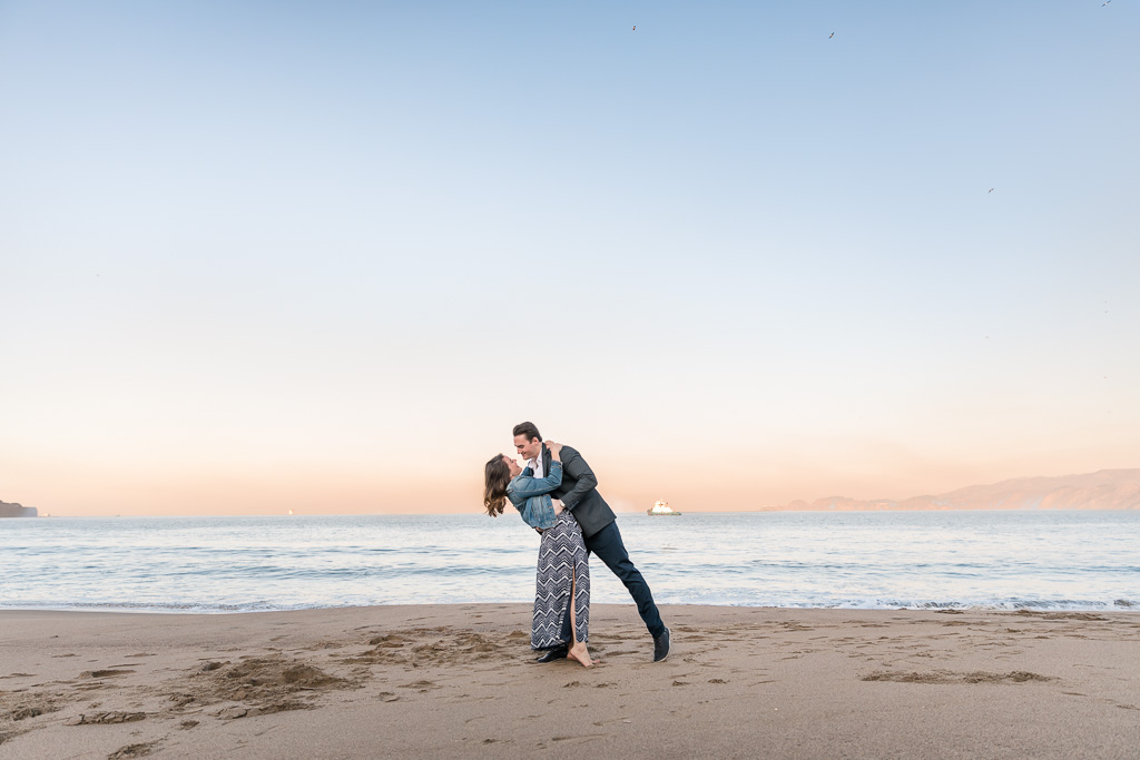 beach engagement photos with gorgeous sunrise colors