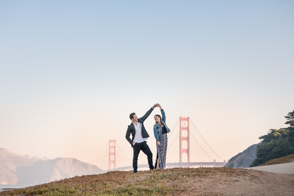 twirling in front of Golden Gate Bridge