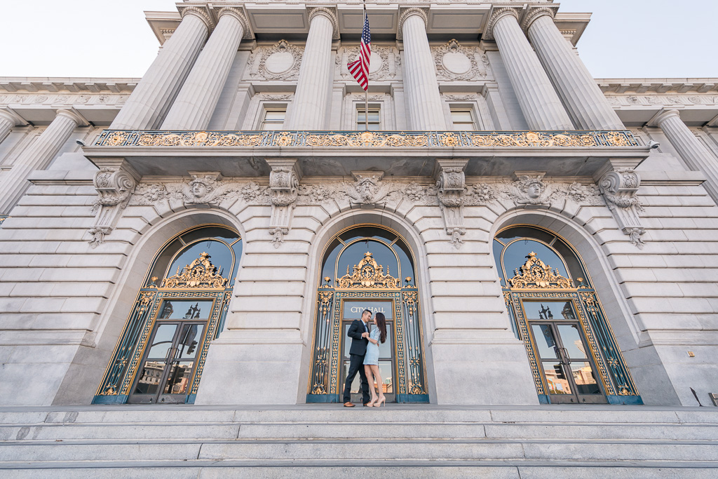 engagement photo outside of San Francisco City Hall