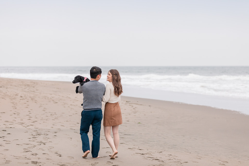 San Francisco romantic beach engagement photo with puppy