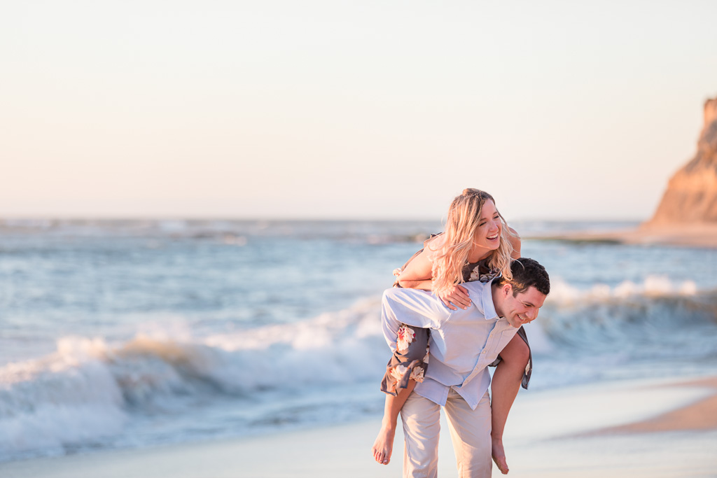 playful and candid Bay Area beach engagement photo
