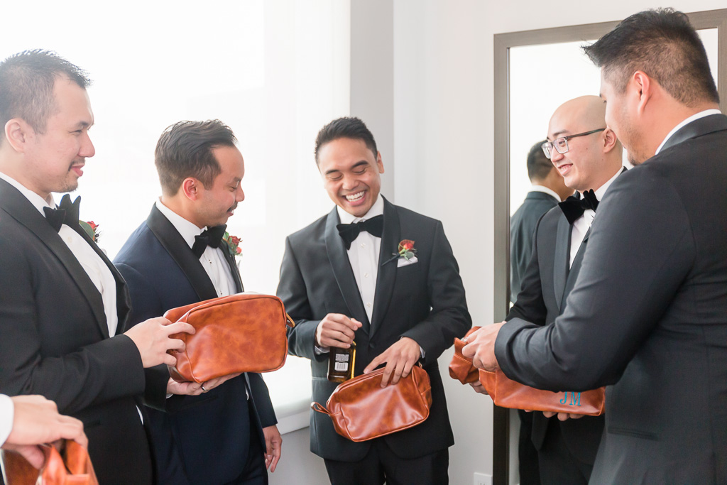 handing out groomsmen's gifts