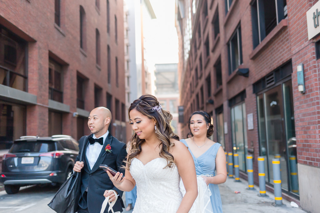 bride exiting Hotel Via for her first look