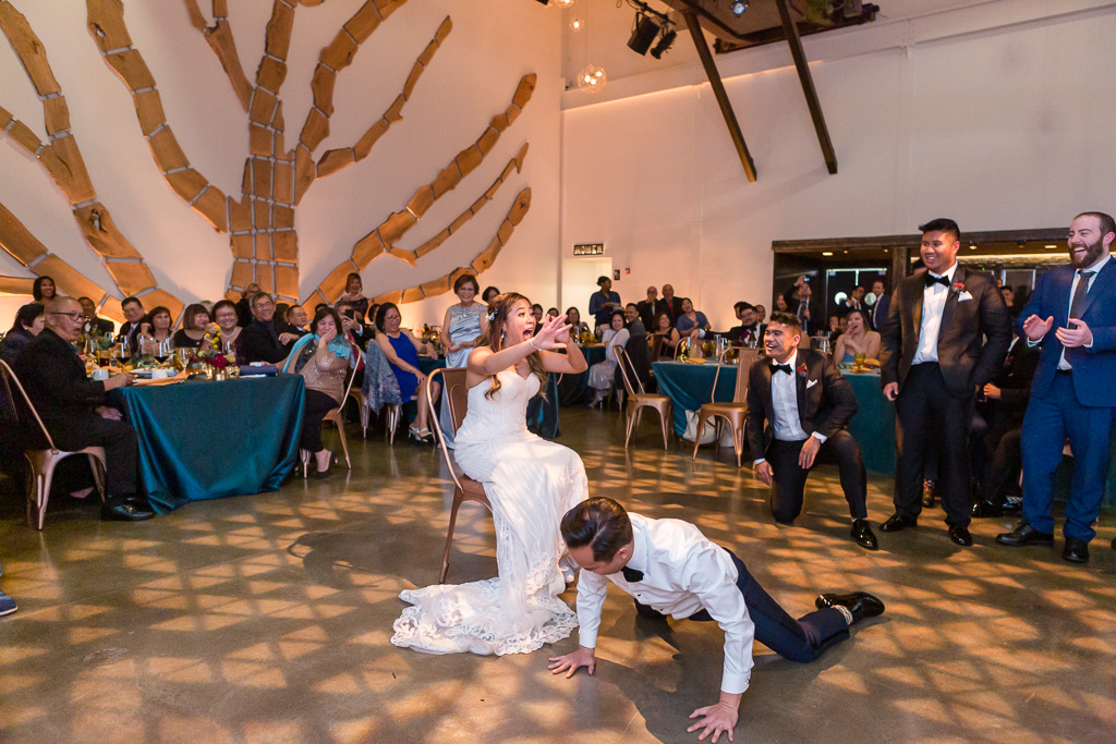 groom surprised bride with a sexy dance