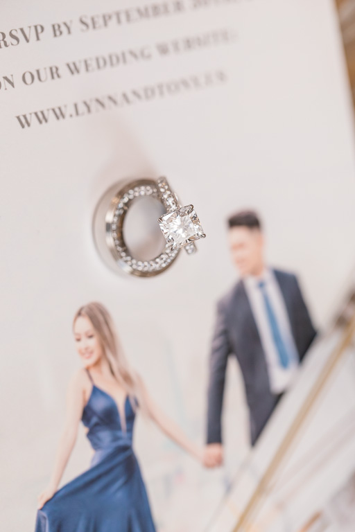 wedding ring set on invitation suite